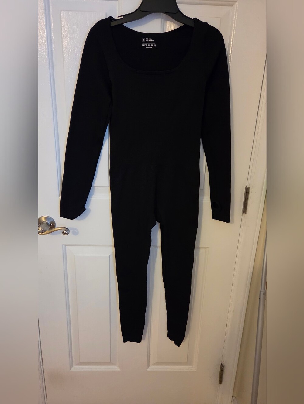 Medium Black Long-Sleeve Thermal One-Piece Body Suit.